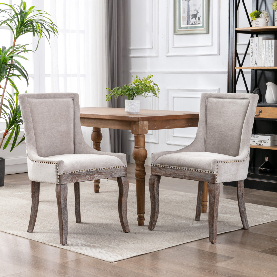 A&A Furniture,Ultra Side Dining Chair，Thickened fabric chairs with neutrally toned solid wood legs， Bronze nail head，Set of 2，Beige